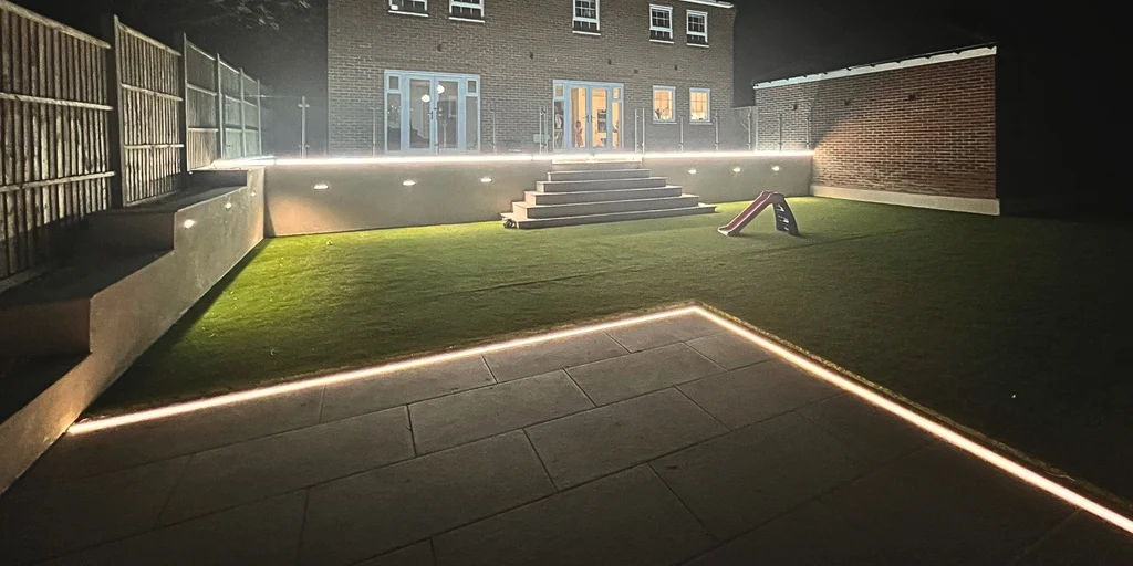Low-voltage path lights along a garden walkway
